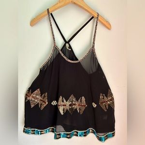 Small BB Dakota top with sequin design. Never been worn!